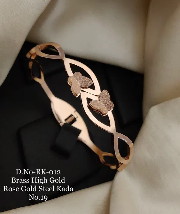 https://d1311wbk6unapo.cloudfront.net/NushopCatalogue/tr:f-webp,w-600,fo-auto/D.NO-RK-012 Brass High Rose Gold Steel Kada_1685186190155_69l6k48of1qrly1.jpg__Ketmera